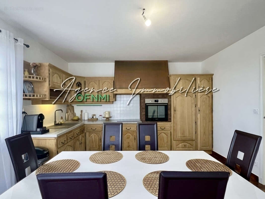 Maison à ECOTAY-L&#039;OLME