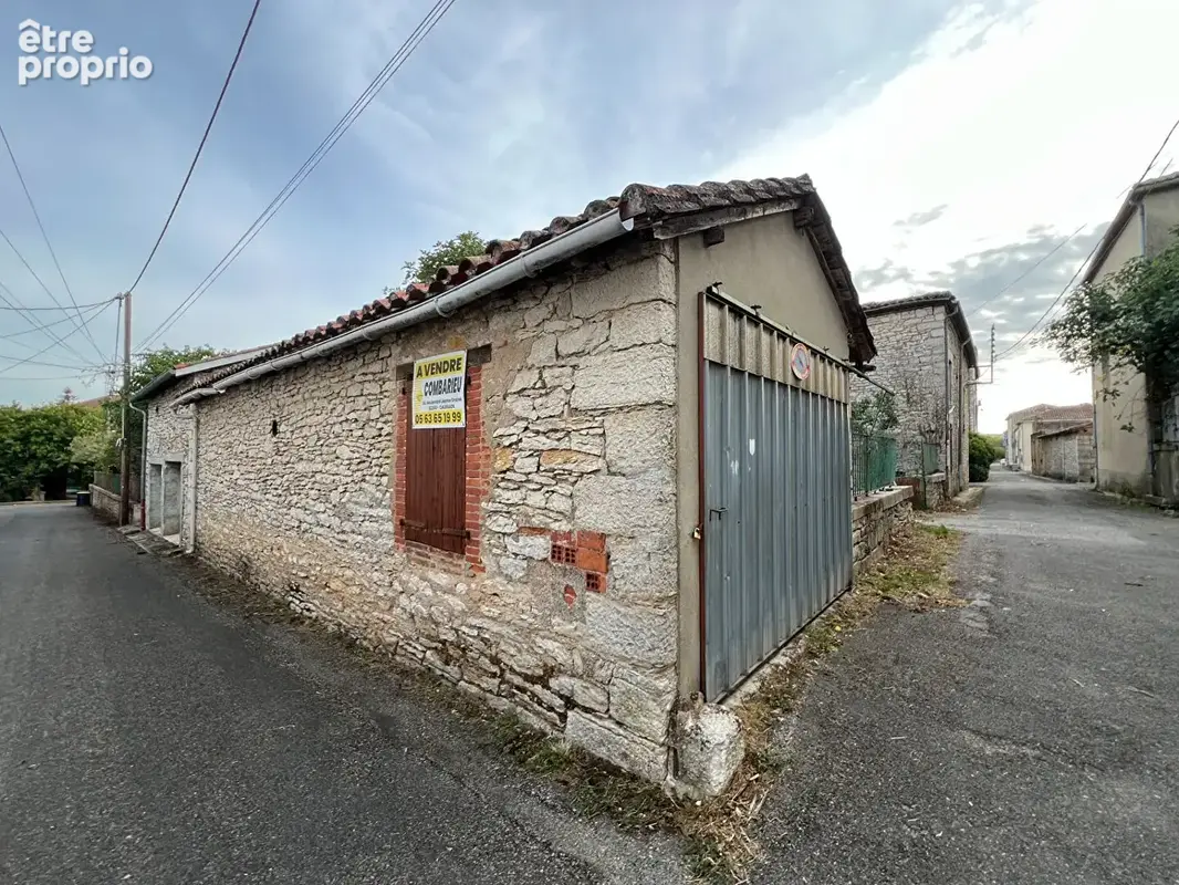 Maison, terrain + 6 garages - Ensemble immobilier en pierre - Potentiel exceptionnel et multiples projets - photo 4