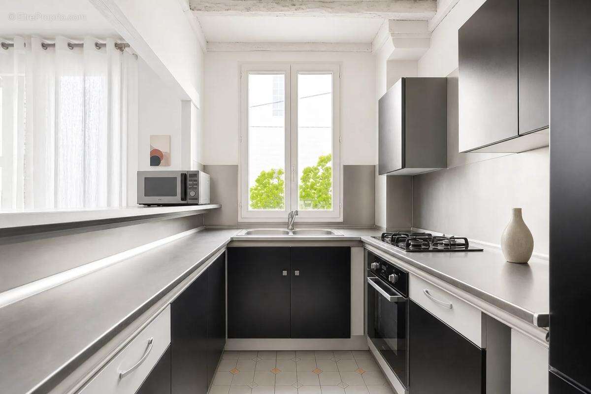 Maison de 4 pièces de 65 m² à Épinay-sur-Seine - photo 2