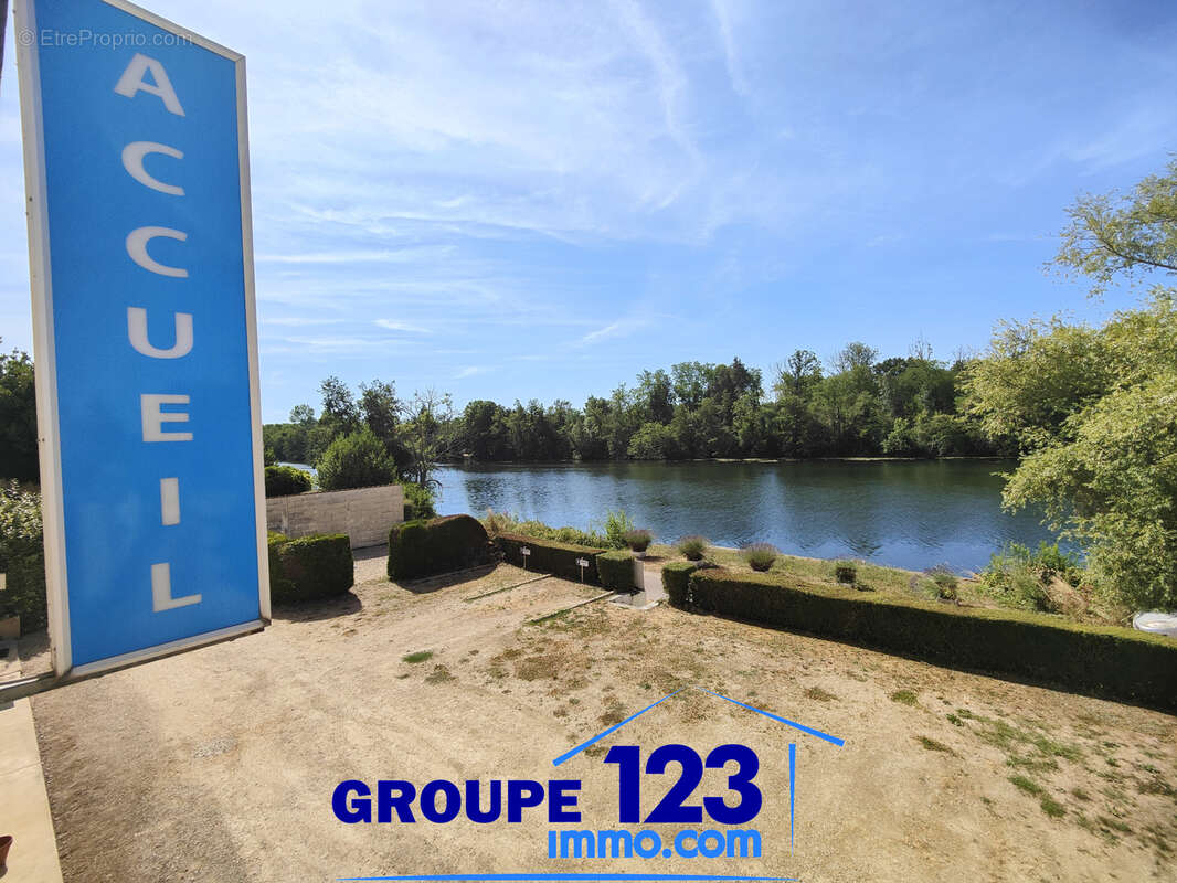 Un bien atypique avec vue sur l’Yonne et de multiples possibilités - photo 10