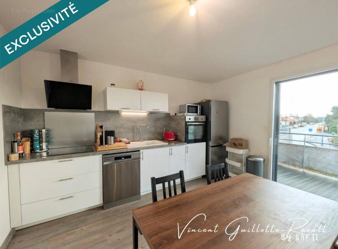 Photo 1 - Appartement à BOUGUENAIS