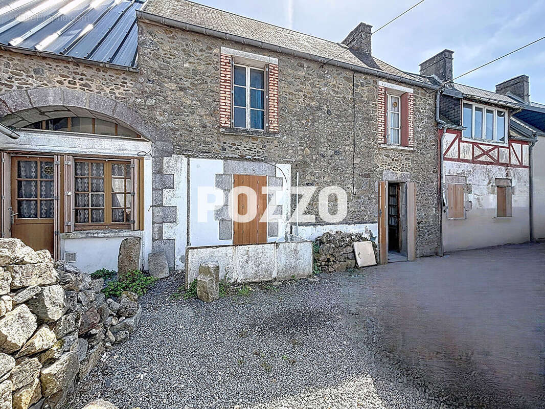 Maison à AGON-COUTAINVILLE
