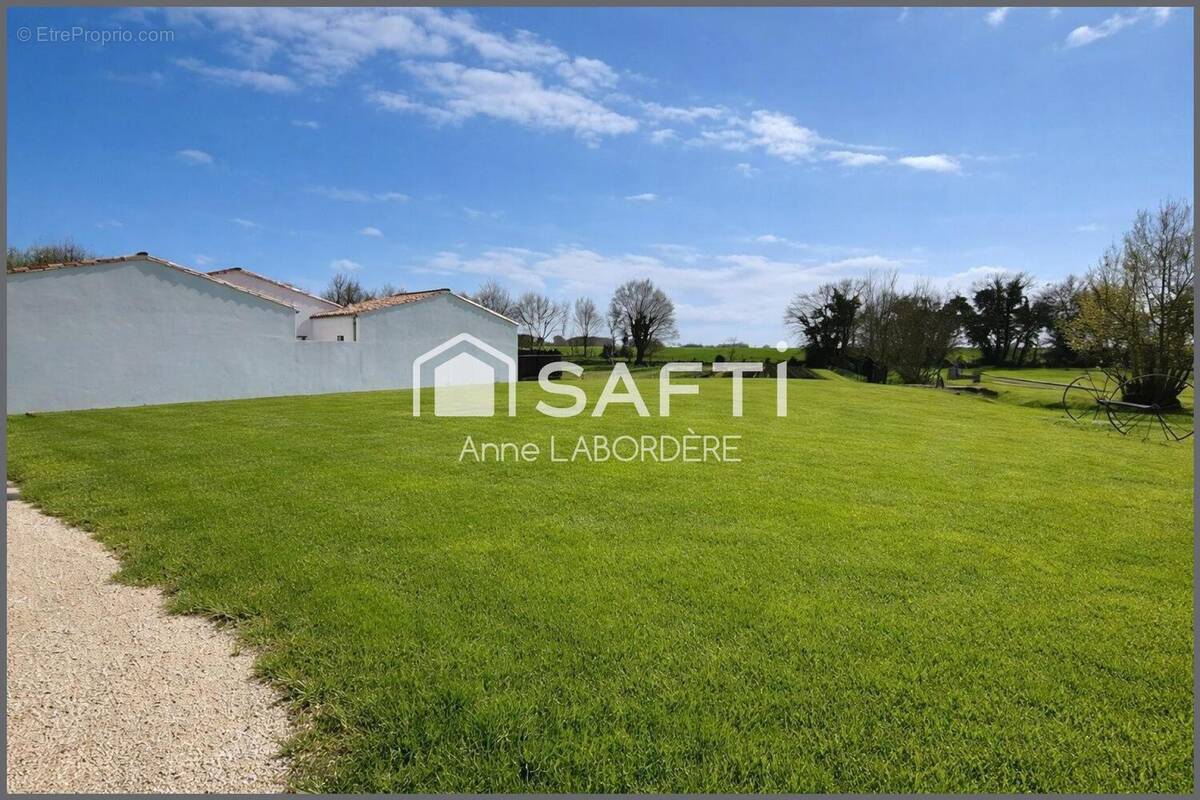 Photo 1 - Terrain à SAINTE-SOULLE