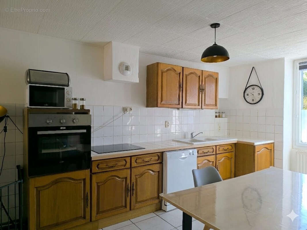 Maison 98 m² à Saint-Jean-Le-Vieux  - photo 3