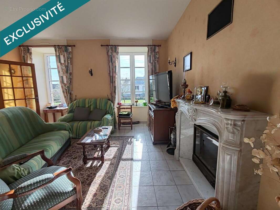 Photo 2 - Maison à FOUGEROLLES-DU-PLESSIS