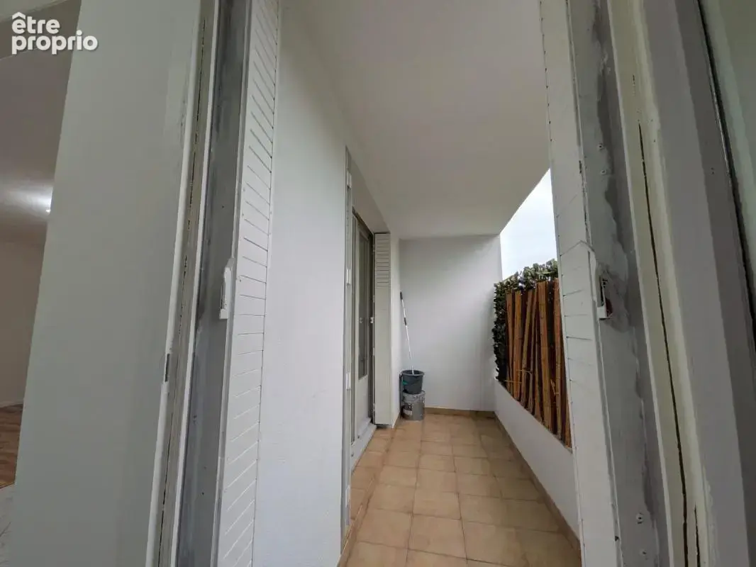 EXCLUSIVITÉ ORPI — Aix-les-Bains : T2 rénové en rez-de-chaussée avec balcon, cave et parking - photo 5