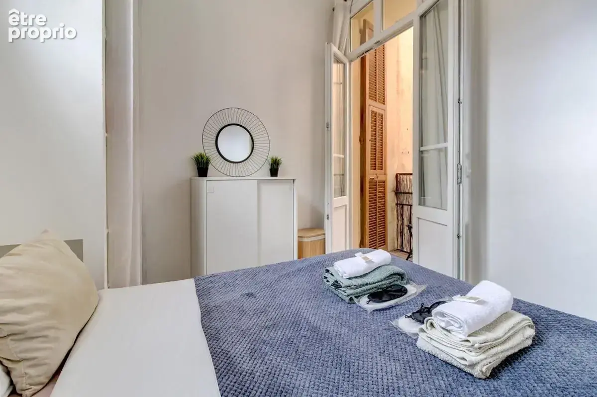 Nice centre-ville – 2 pièces de 31,79 m² avec balcon, hauteur sous plafond et vue sur les toits - photo 6