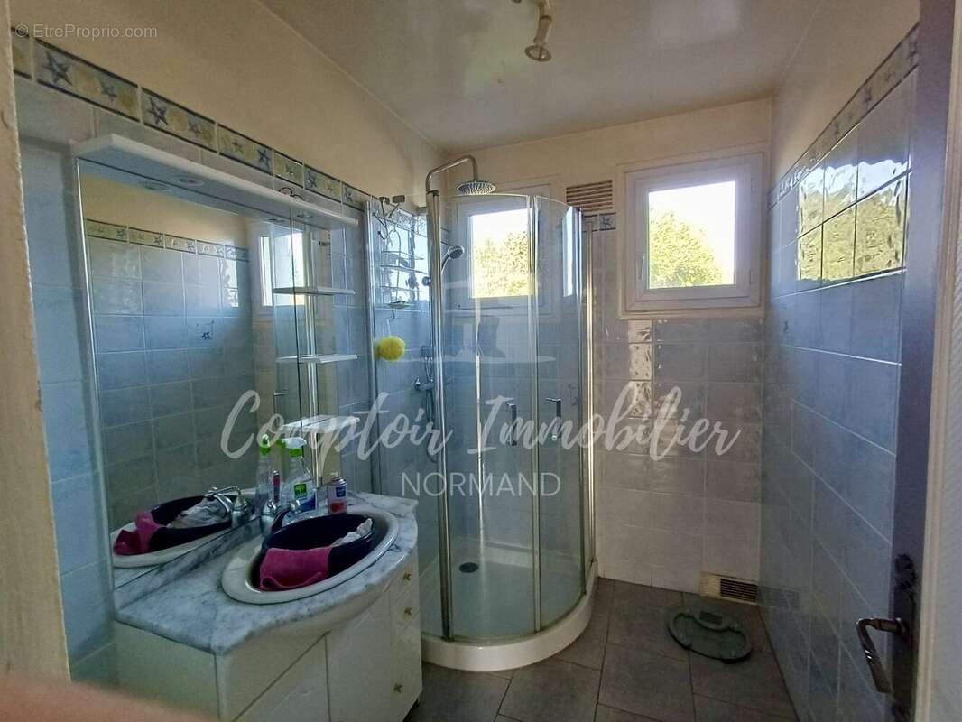 Maison à THIL-MANNEVILLE