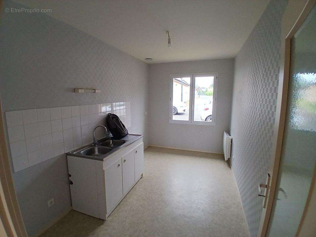 Maison T2 de plain-pied avec garage et jardin - photo 5