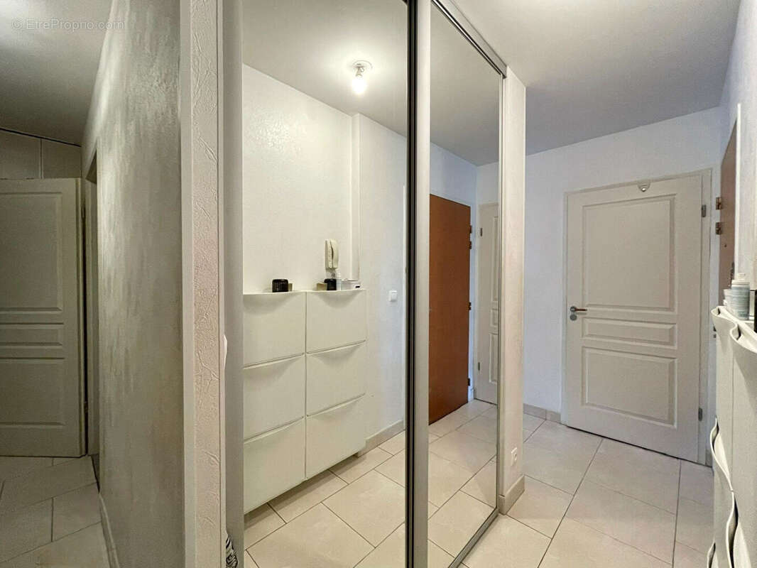 Appartement en rez-de-jardin avec garage, parking, cave, terrasse et jardin - photo 11