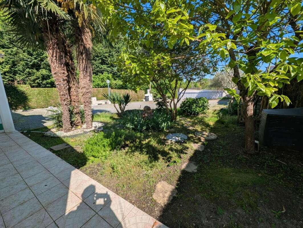 Photo 2 - Maison à SAINT-SYLVAIN-D'ANJOU