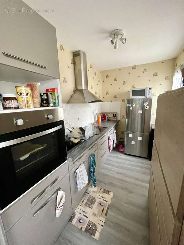 cuisine équipée et aménagée - Appartement à PERIGUEUX