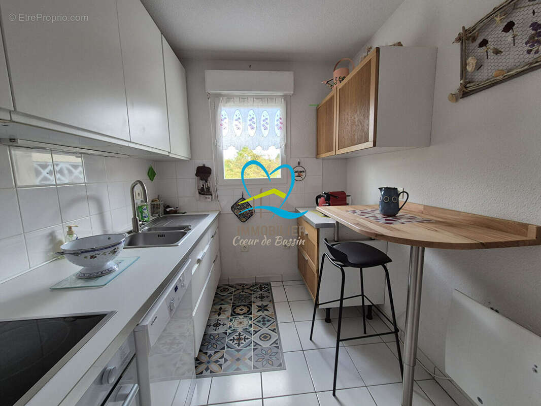 Appartement  3 pièce(s) 64.41 m2 VUE BASSIN - photo 2
