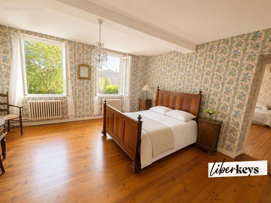 Maison T5 avec jardin, garage et vaste potentiel d’aménagement - photo 6