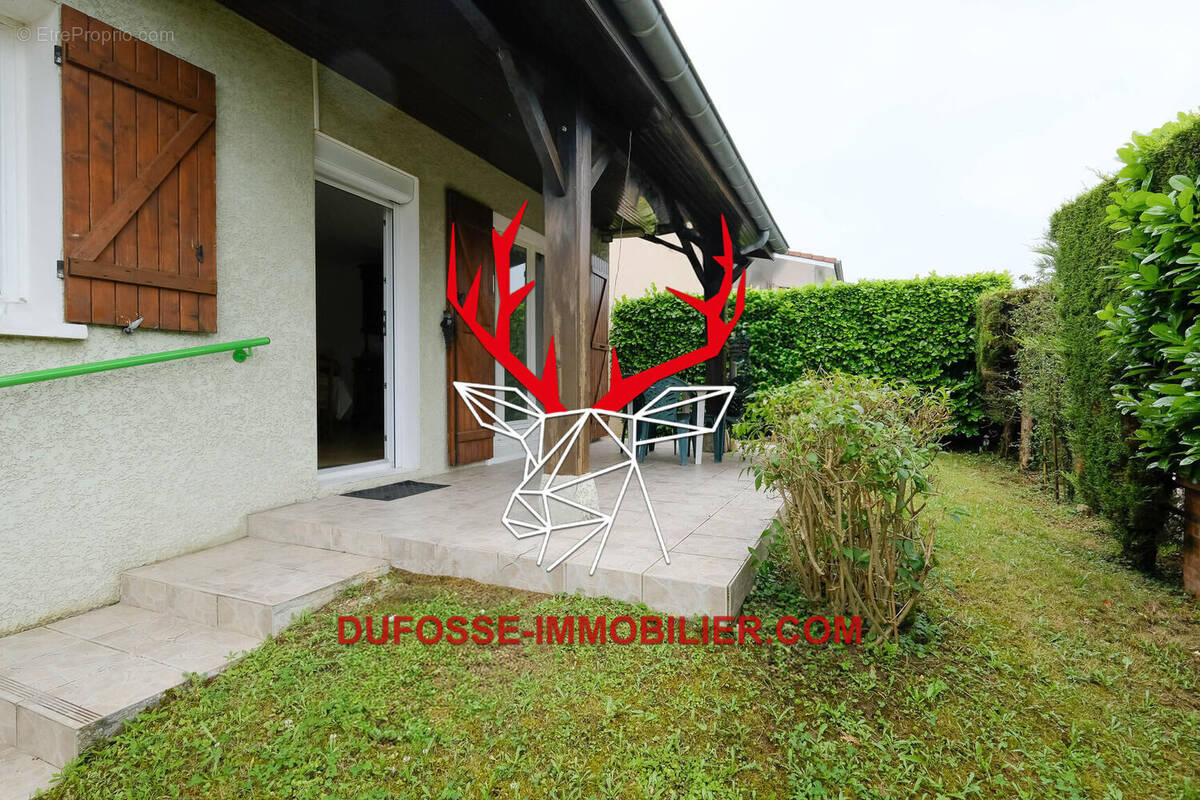 Photo 1 - Maison à JASSANS-RIOTTIER