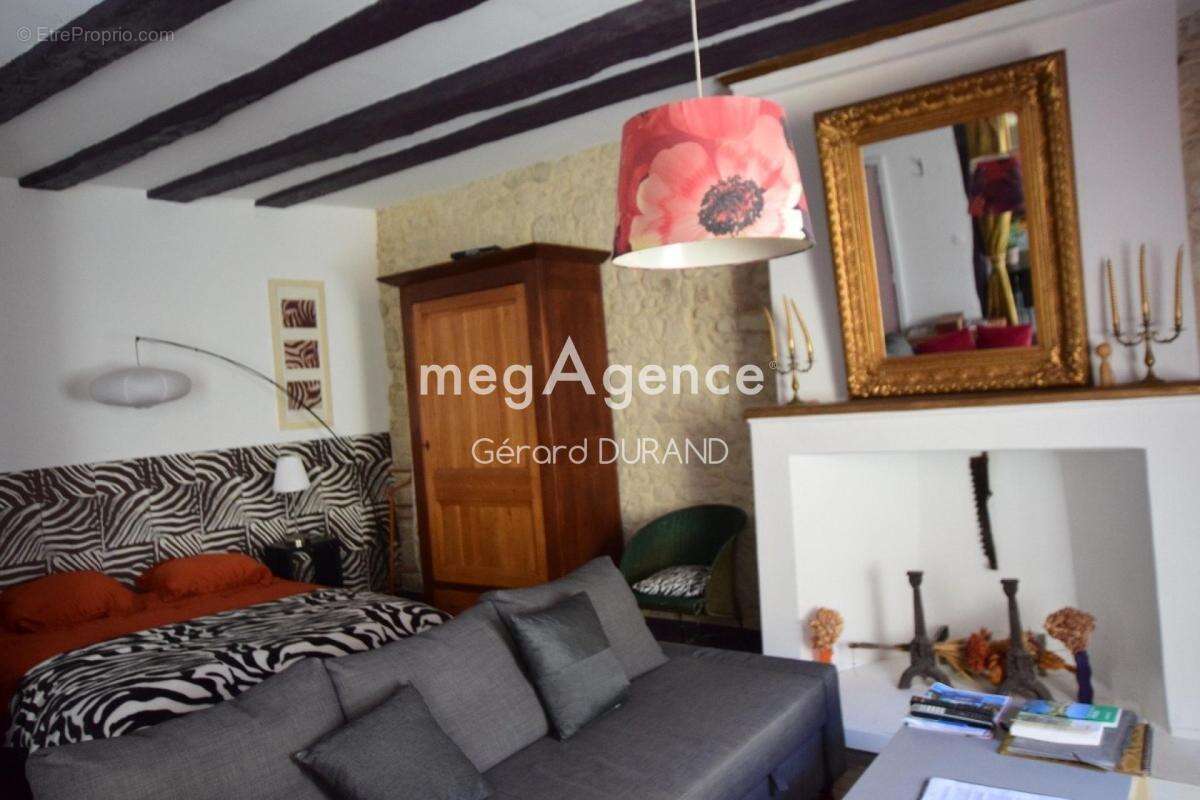Maison authentique en pierres et poutres apparentes contenant 3 appartements - photo 4
