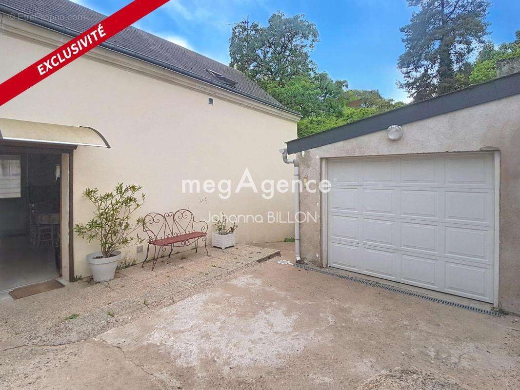 Maison de charme avec véranda, annexes et caves !! - photo 6