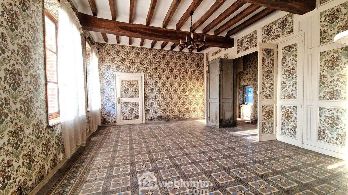 Un séjour de 34 m² - Maison à MONTAIGU