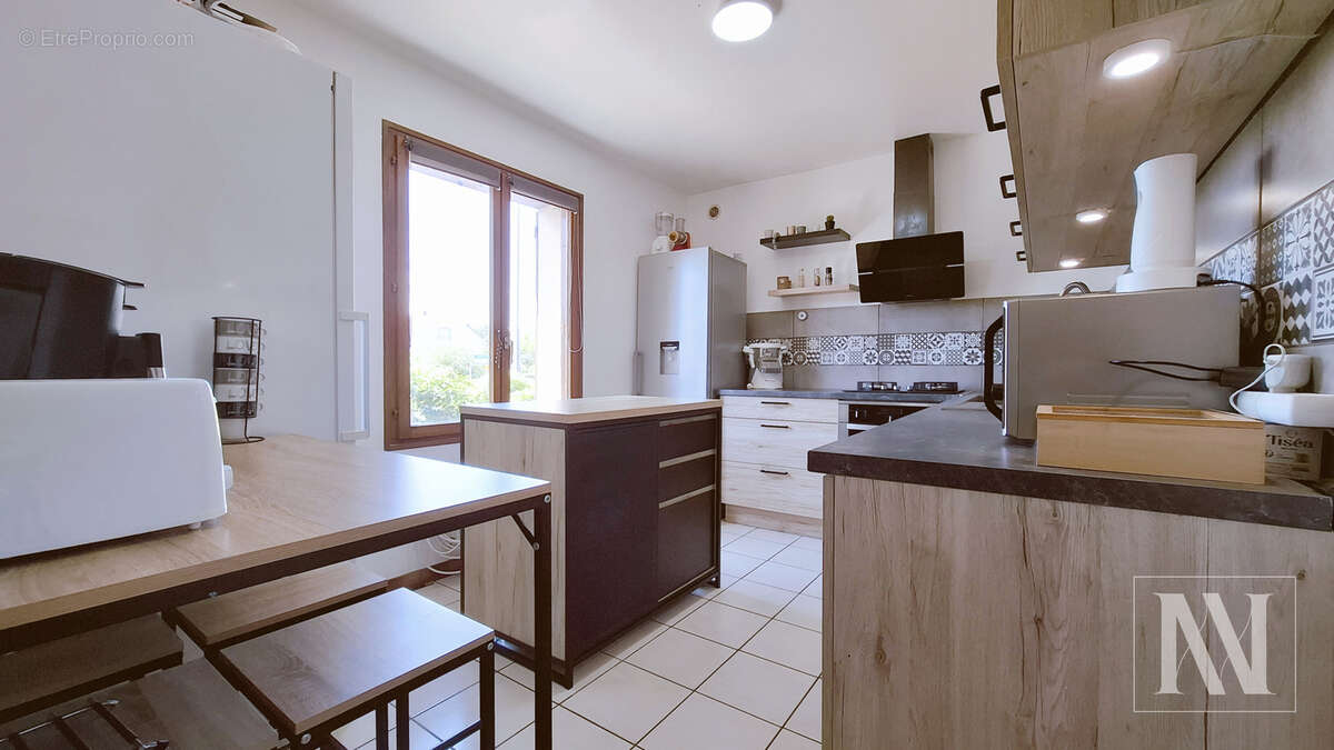 Maison de plain-pied avec sous-sol semi-aménagé   Emplacement recherché, proche de toutes commodités - photo 7