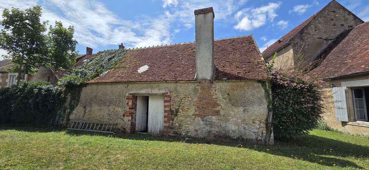 Maison à MENOU