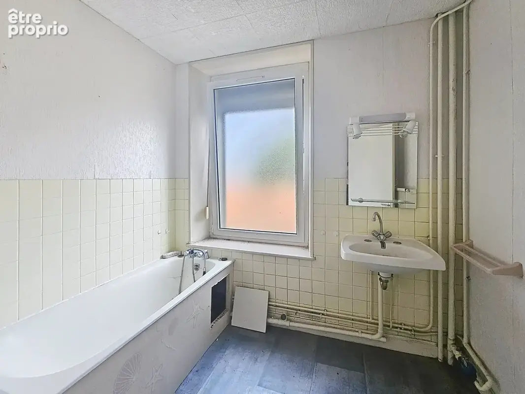 Immeuble de rapport - 6 appartements + 1 local professionnel - photo 12