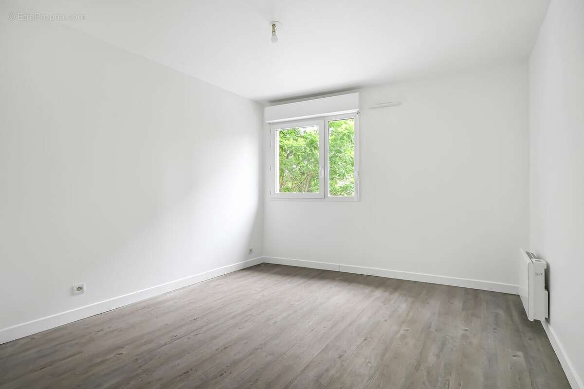 Chambre 1 parentale - Appartement à SAINT-DENIS