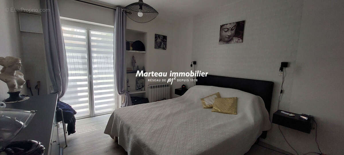 A VENDRE Longère rénovée de plain-pied avec piscine, grand terrain et beaux atoutsBrette Les Pins 5 pièce(s) 126 m2 - photo 6