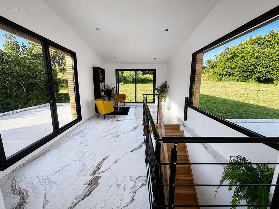 Quand le loft rencontre l'horizon. Un loft d'exception avec ascenseur, terrasse panoramique de 400 m² et vue sur l'Odet - photo 6