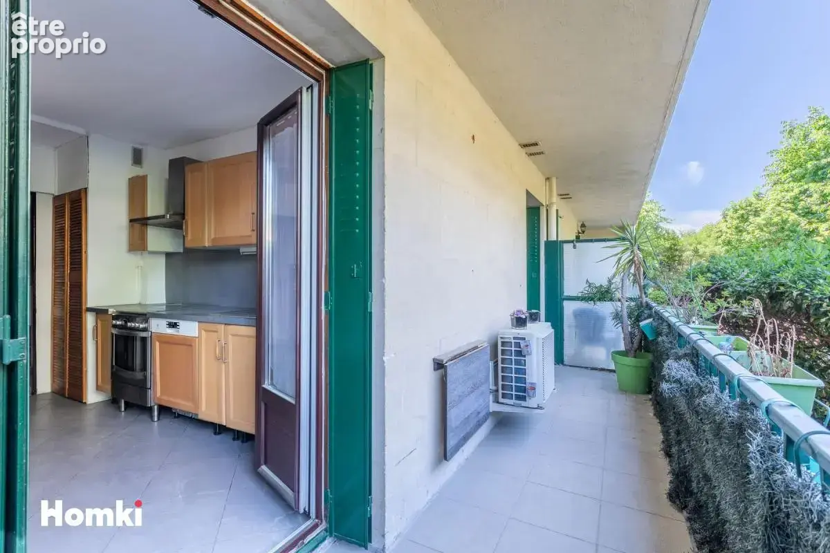 13012 t3 en rdc de 54 m² a 15 minutes a pied du metro de st barnabe - photo 3