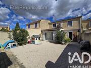 Photo 1 - Maison à LAUDUN-L'ARDOISE