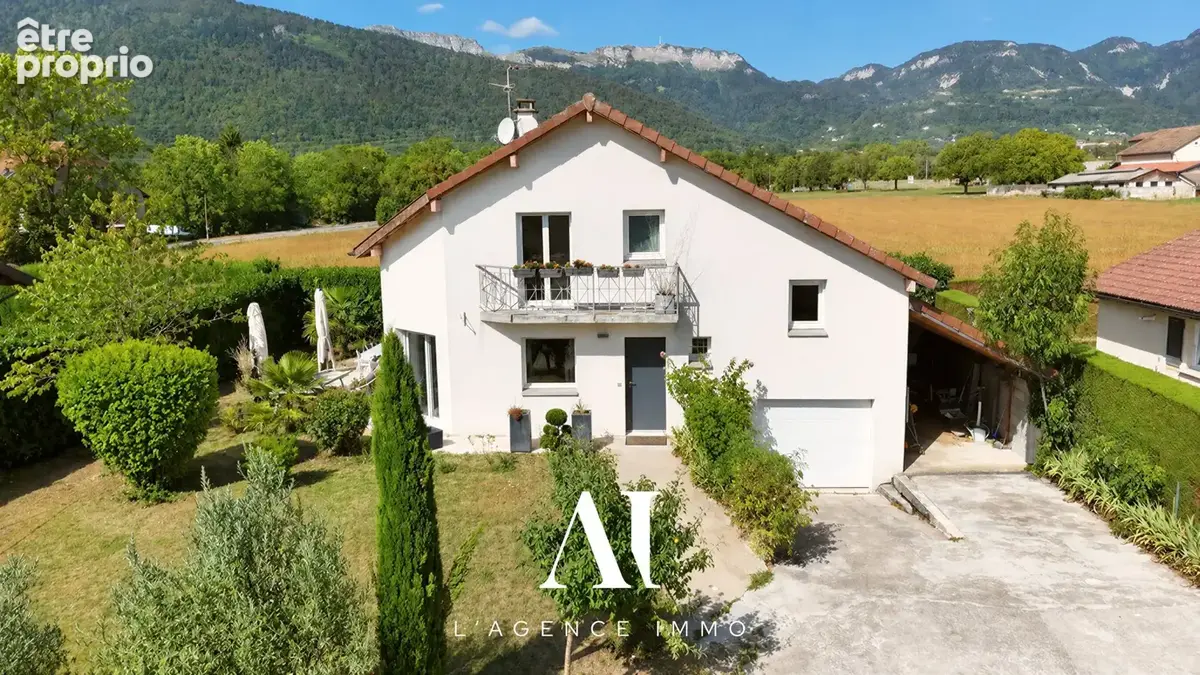 Maison 7 pièces 165 m² à vendre à Cessy (01170) - photo 2