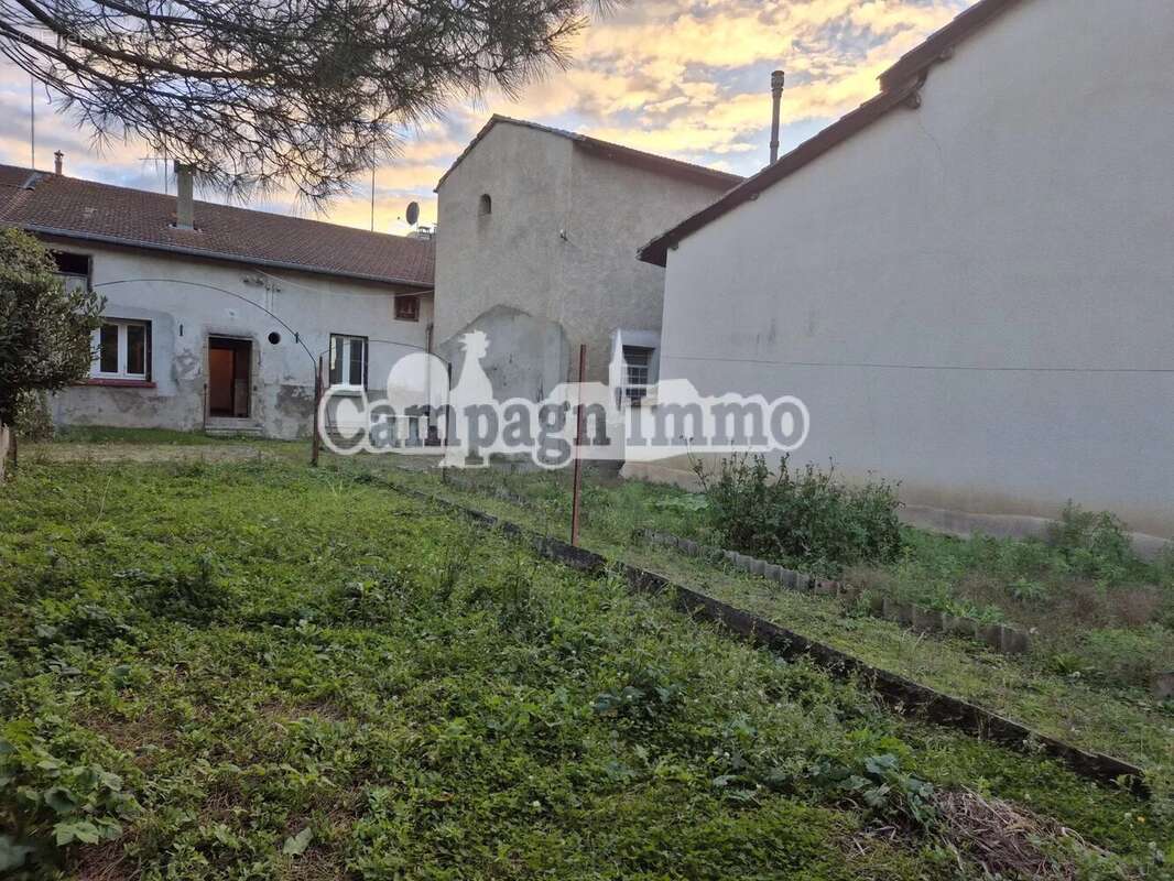 Maison à ESSERTINES-EN-DONZY