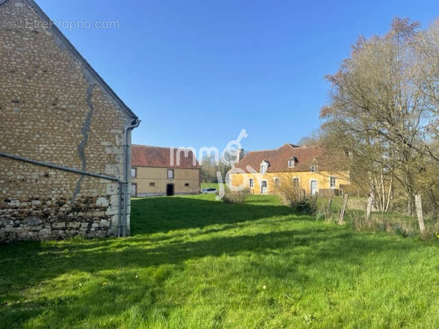 Maison à CONDE-SUR-HUISNE