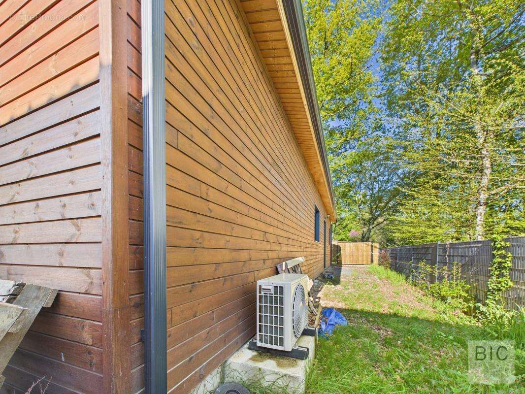 A vendre maison état neuf en bois avec jardin plein sud - photo 24