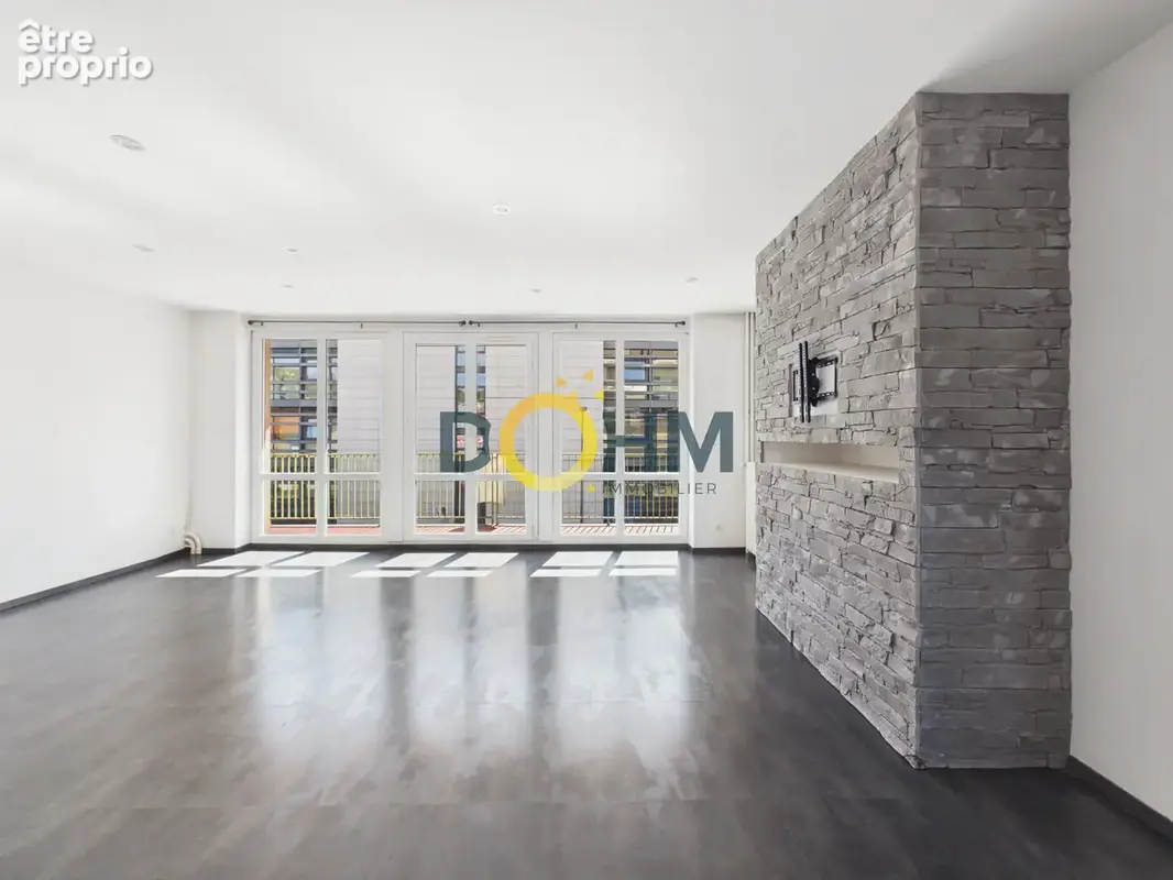 Appartement T4 de 109 m2 rénové avec goût au 1er étage avec ascenseur - photo 4