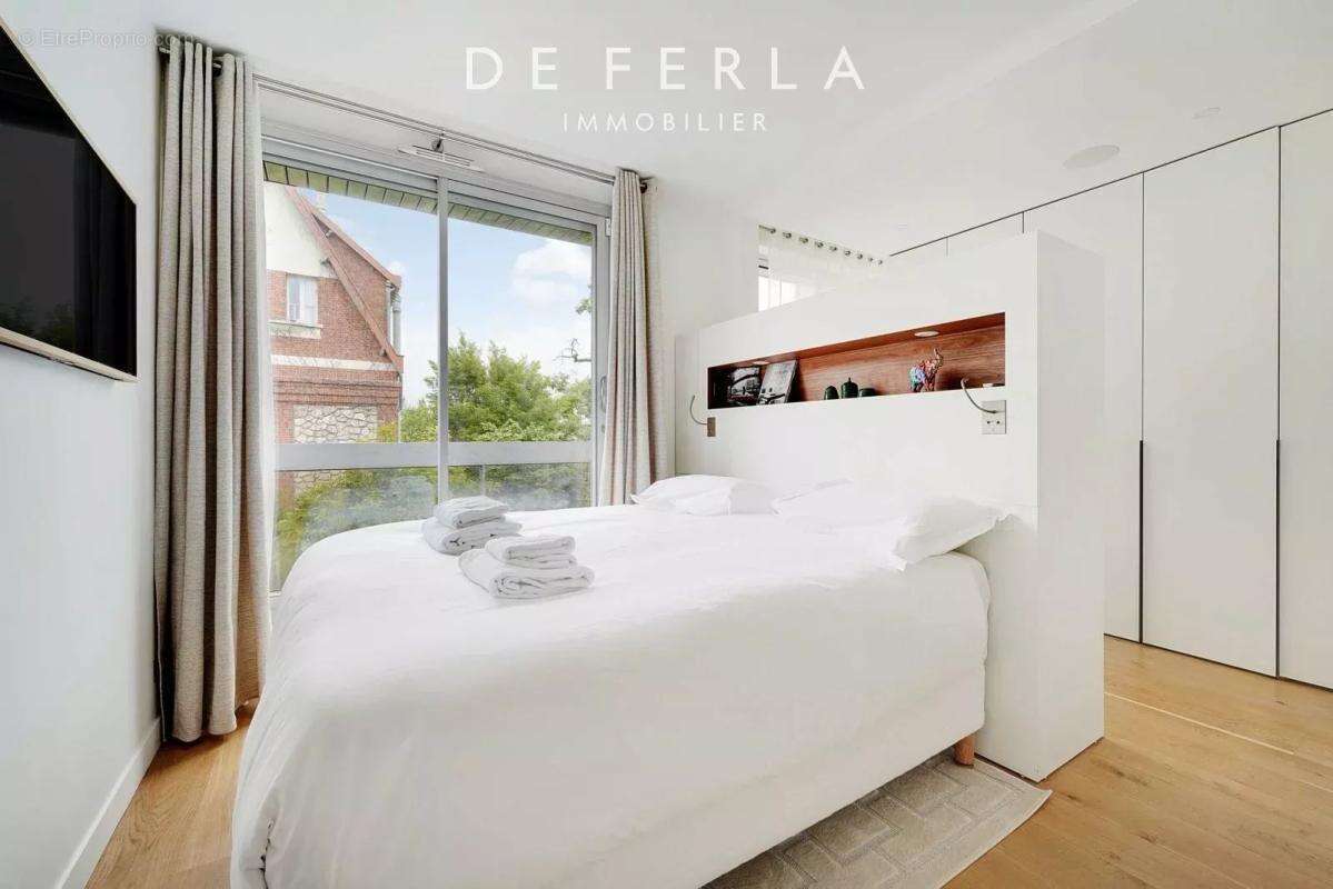 Boulogne-Billancourt – Avenue Robert Schuman  Duplex d'exception et terrasse panoramique - photo 12