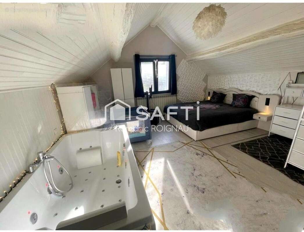 Photo 8 - Maison à MONTREUIL-AUX-LIONS