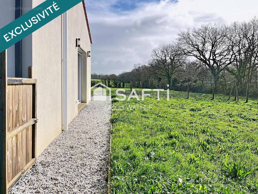 Photo 1 - Maison à GROSBREUIL