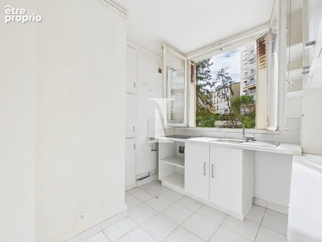 Appartement 3 pièces 60 m² à vendre à Paris-15e (75015) - photo 2