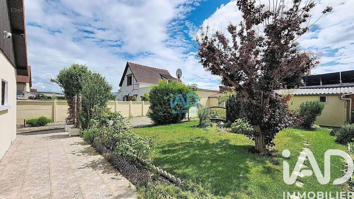 Photo 1 - Maison à SAINT-ETIENNE-DU-ROUVRAY