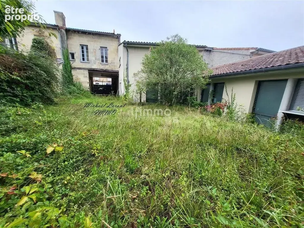 Local commercial loué + appartement + terrain - photo 6