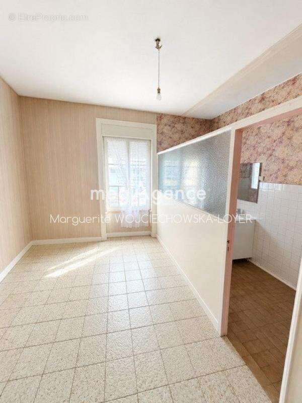 Maison de ville en pierre avec double garage - Fort potentiel - photo 10