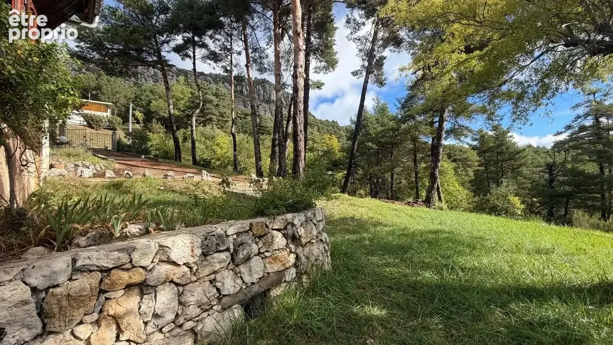 Chalet en bois avec terrasse plein sud et grand terrain arboré de 2 680 m² - photo 14