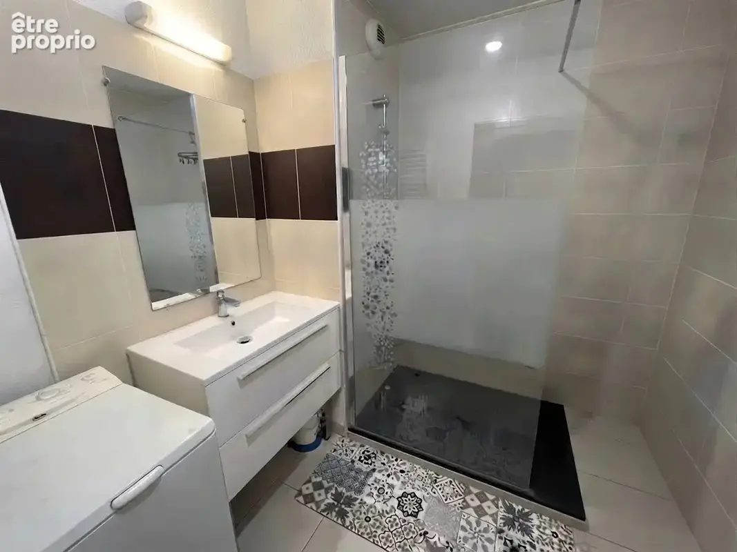 Appartement T3 en RDC - photo 5