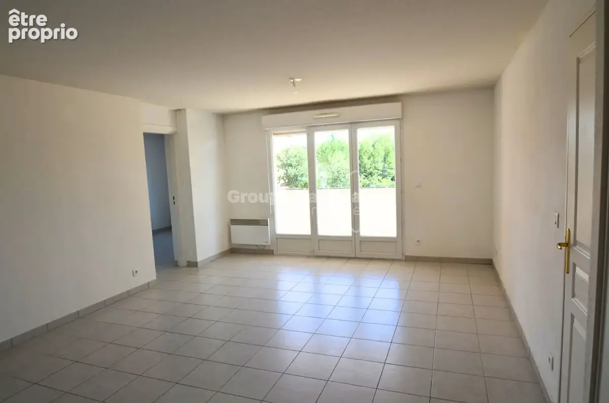 T3 climatisé de 55 m²  avec balcon couvert + garage privatif au sous-sol  dans une copropriété recherchée - photo 3