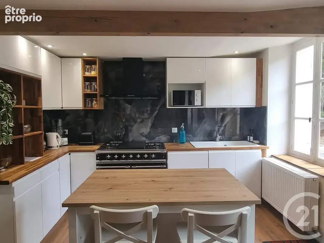 Maison 6 pièces 150 m² à vendre à Sury-En-Vaux (18300) - photo 6