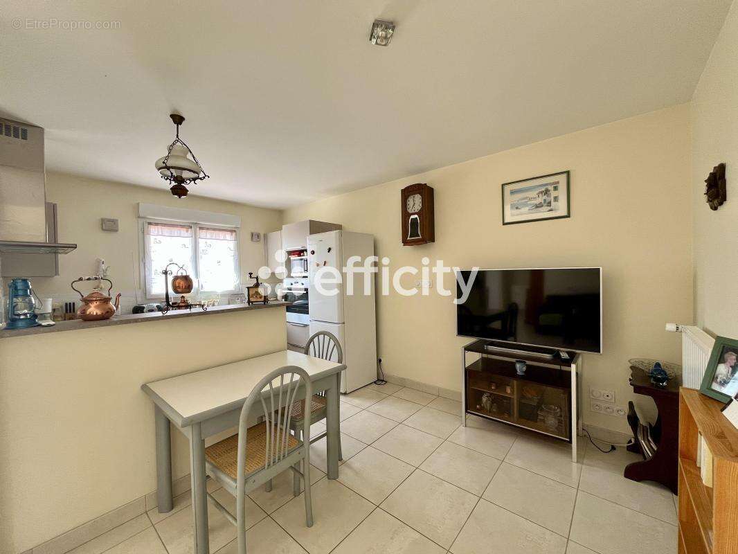 Maison 80 m² à Buxerolles  - photo 6