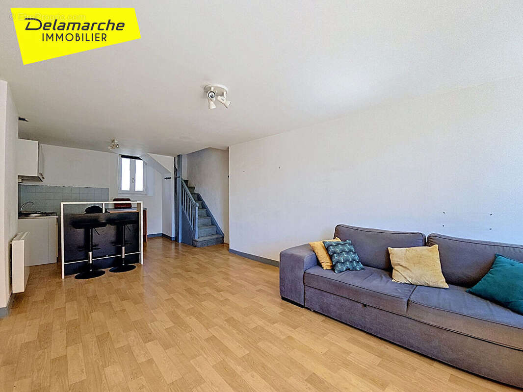 A vendre immeuble Brehal local commercial + appartement - photo 3