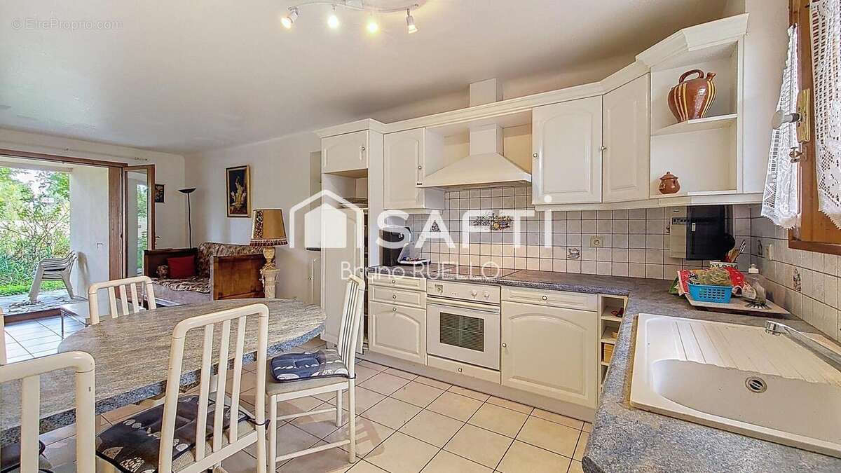 Photo 2 - Maison à SAINT-GENIS-DES-FONTAINES