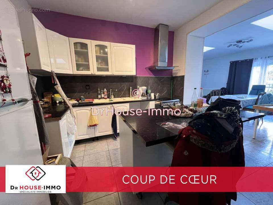 Maison à QUIEVRECHAIN